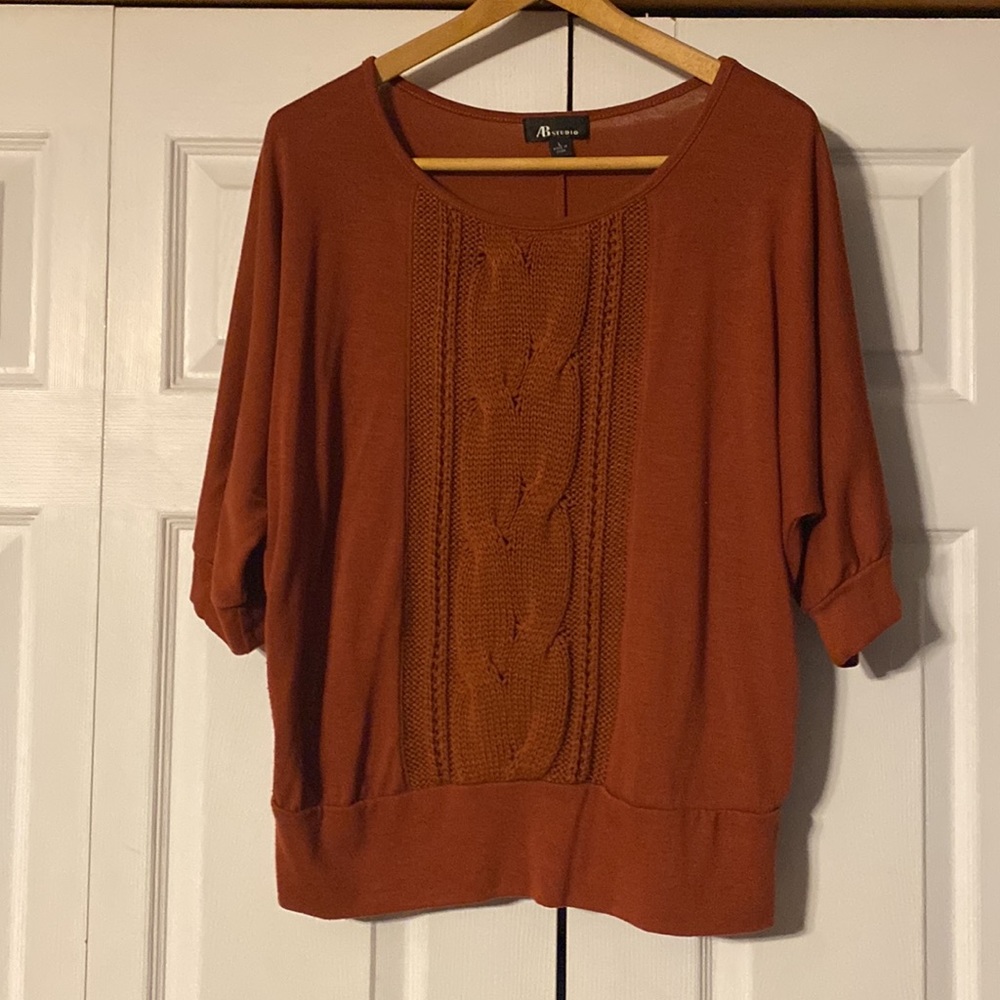 Woman’s Large Shirt- sleeves are about elbow length